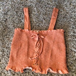 Pink and white polka dot crop top from Pacsun.